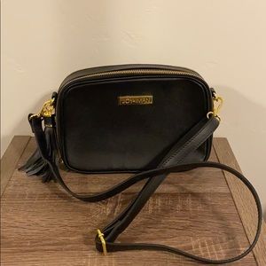 Joy and Iman black leather purse